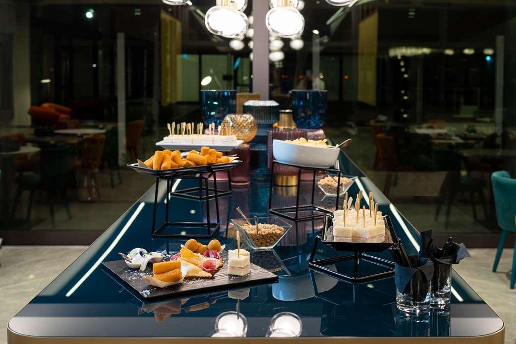 Doubletree By Hilton Milan Malpensa Solbiate Olona Restaurante foto
